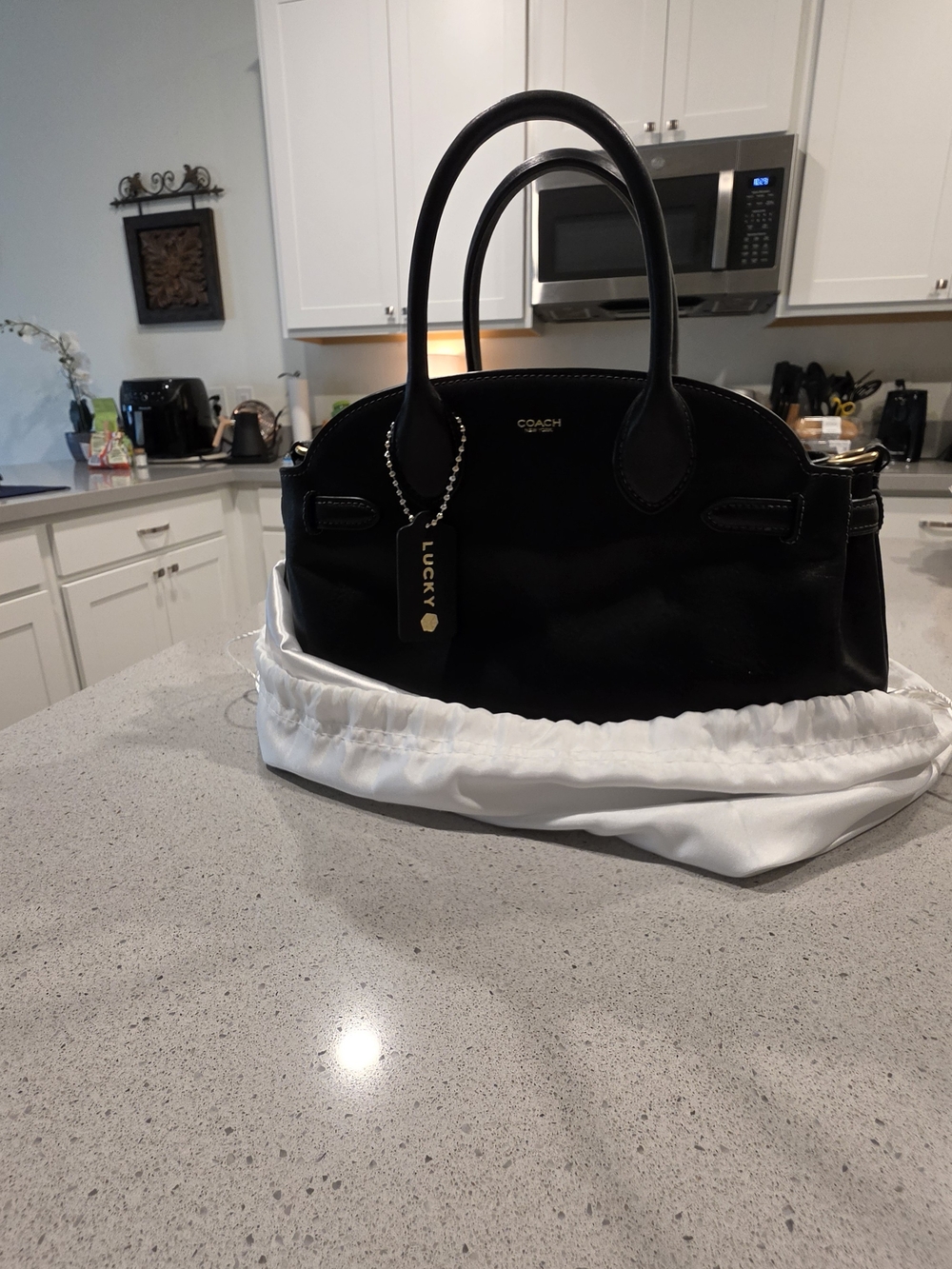 Coach Black Leather Satchel with Top Handles and Charm
